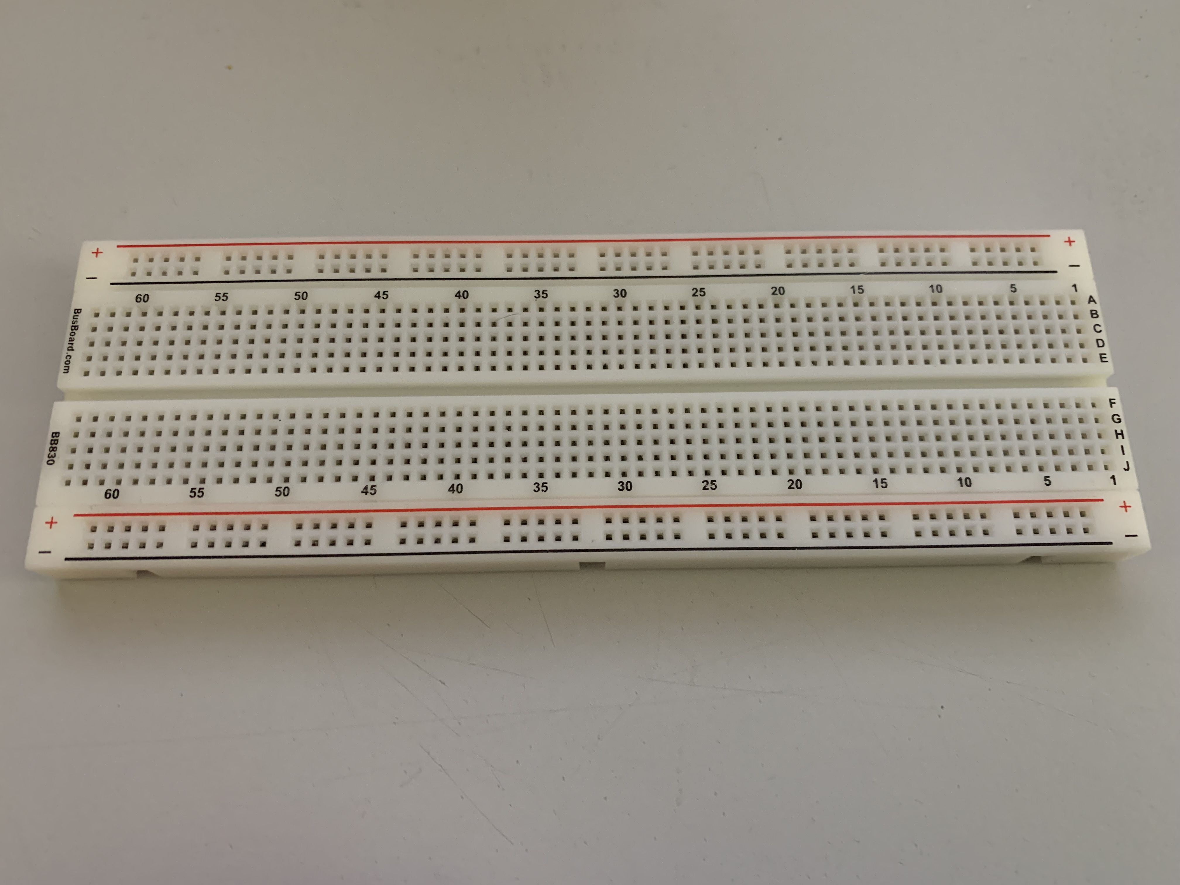 An image of a typical electronics prototyping breadboard